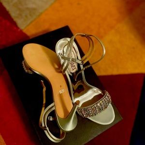 Mint green or sea foam color satin heels with rhinestones.